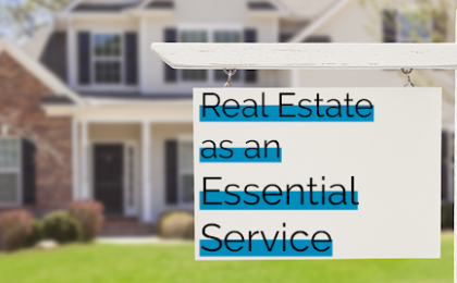 A house and garden in front board